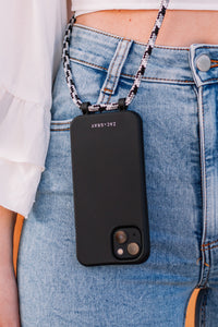 a cell phone is attached to a chain