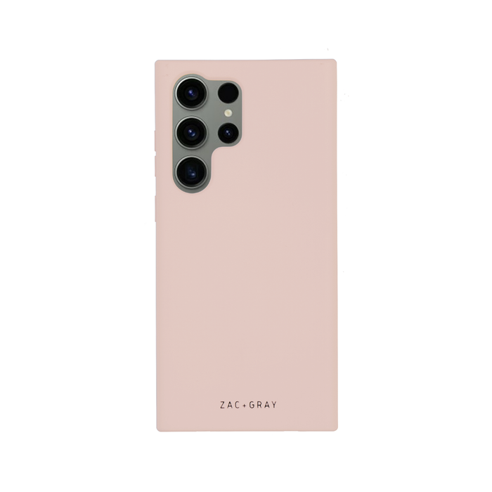 the back of a pink phone case on a white background