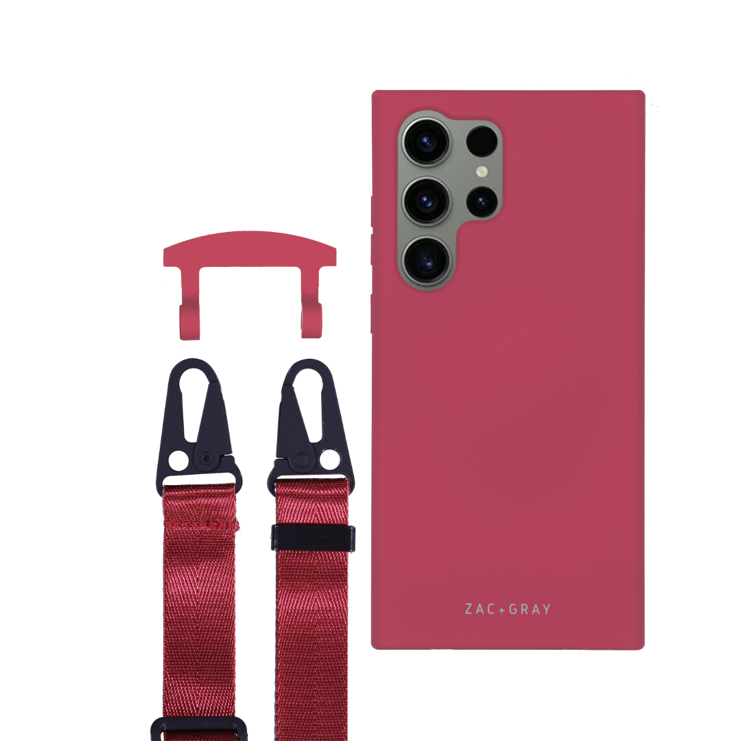 a red phone case with a red strap next to it