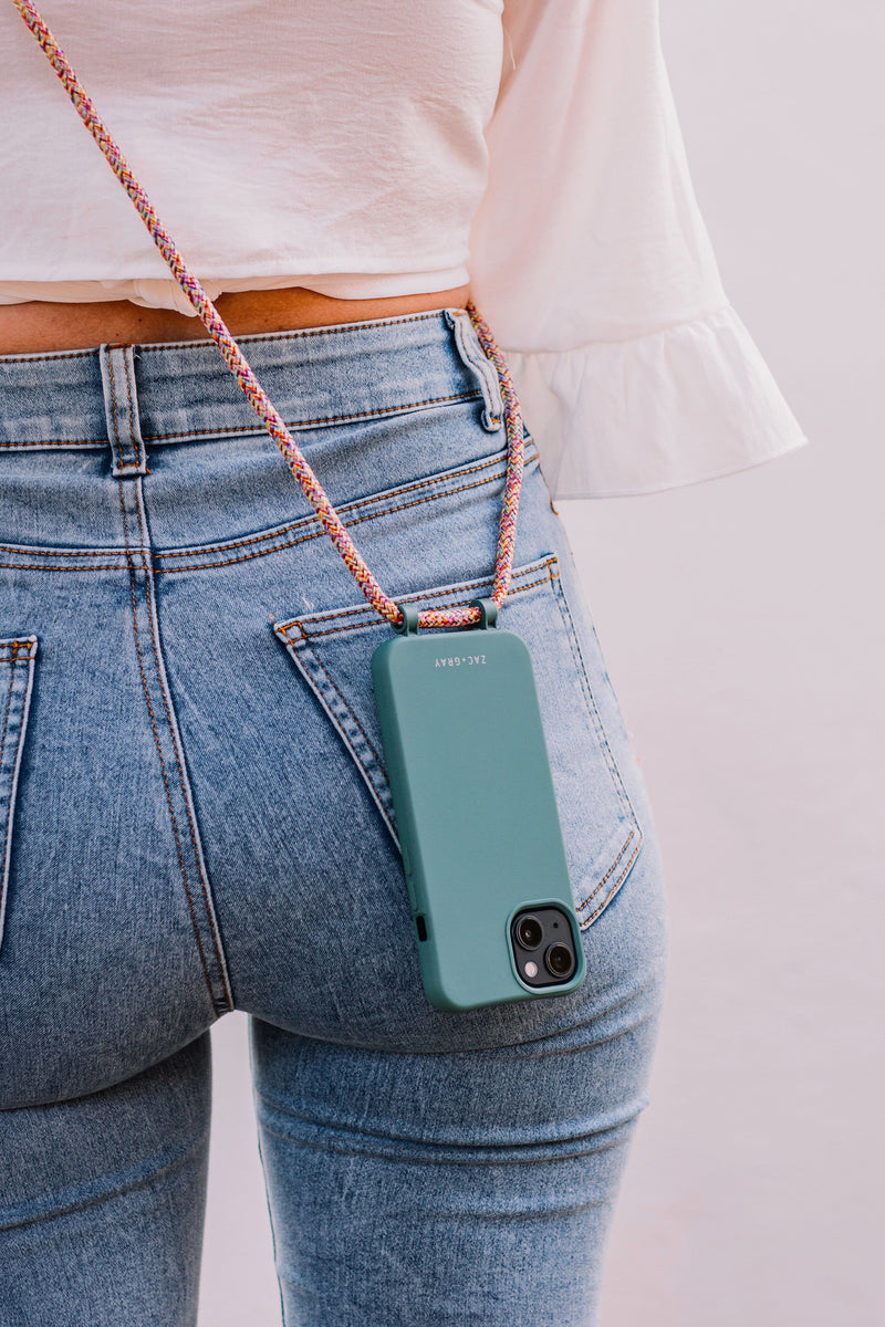 a woman with a cell phone in her pocket