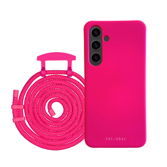 a pink phone case next to a pink charger