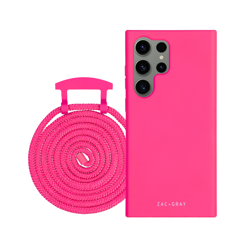 a pink case next to a pink phone